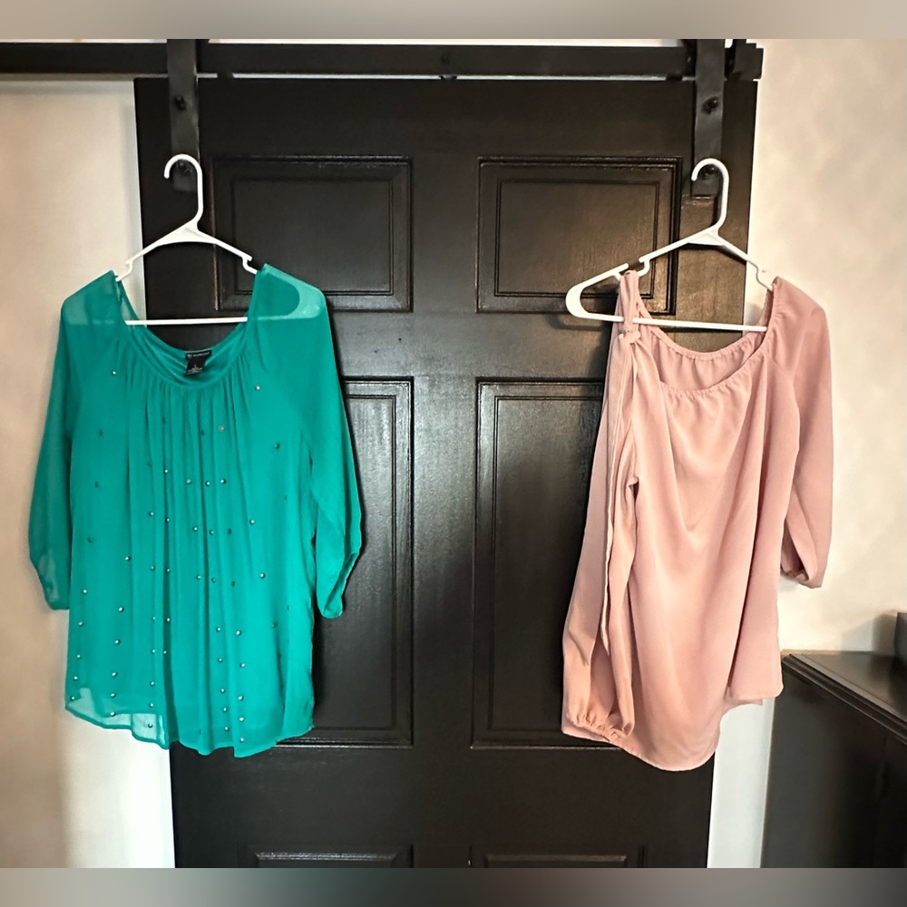 Two items. Long sleeve blouses. Green and pink. Pink has a “cold shoulder”